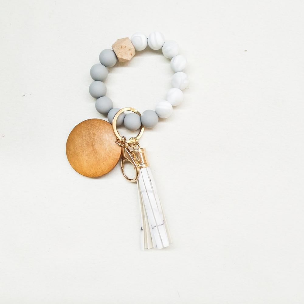 Foreign trade food grade silicone beads wrist keychain PU leather tassel key ring female multi-color optional