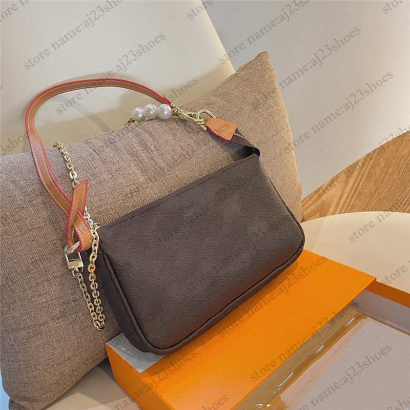 Pochette Accessoires Pearl Chain Bags designer handbags Lady Zippy Wallet Shoulder Small Totes vanity Case Purse Clutch Party Mini Bag
Pochette Accessoires Pearl Chain Bags designer handbags Lady Zippy Wallet Shoulder Small Totes vanity Case Purse Clutch Party Mini Bag
