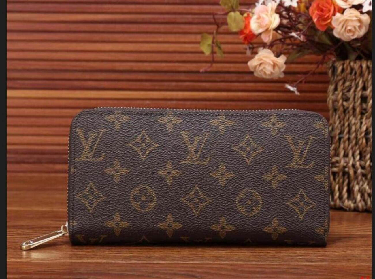 1-17 LV LOUIS 1 VITTON Single zipper WALLET the most stylish cards and coins men leather purse card holder women wallet
1-17 LV LOUIS 1 VITTON Single zipper WALLET the most stylish cards and coins men leather purse card holder women wallet