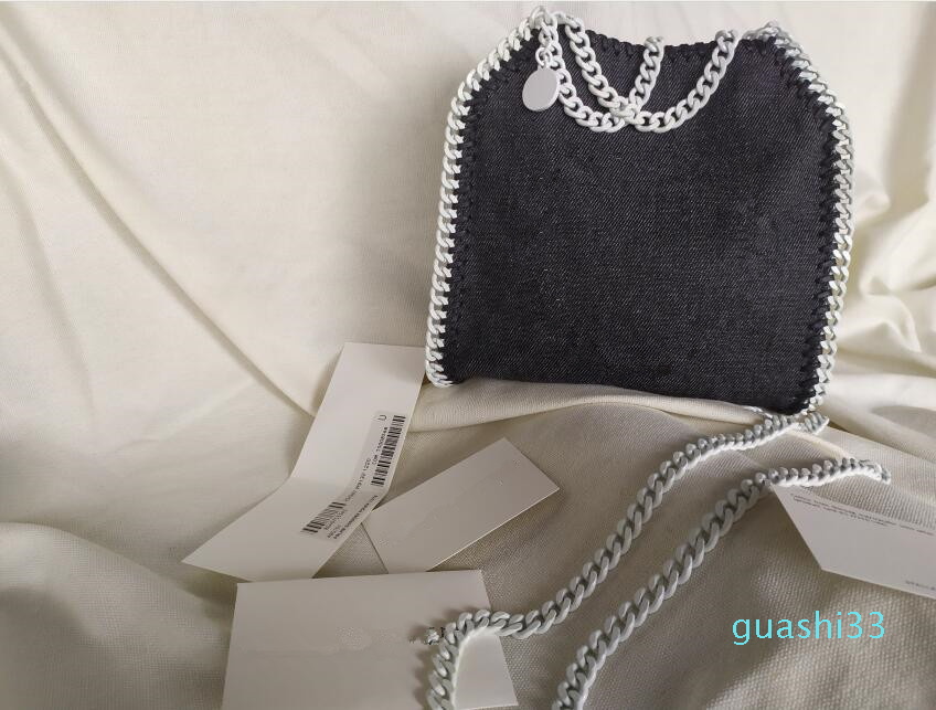 Mini White Slings Stella Mccartney Women Shoulder Bag PVC Leather Hasp Closure Flap Interior Pocket High Quality Totes 18cm
Mini White Slings Stella Mccartney Women Shoulder Bag PVC Leather Hasp Closure Flap Interior Pocket High Quality Totes 18cm