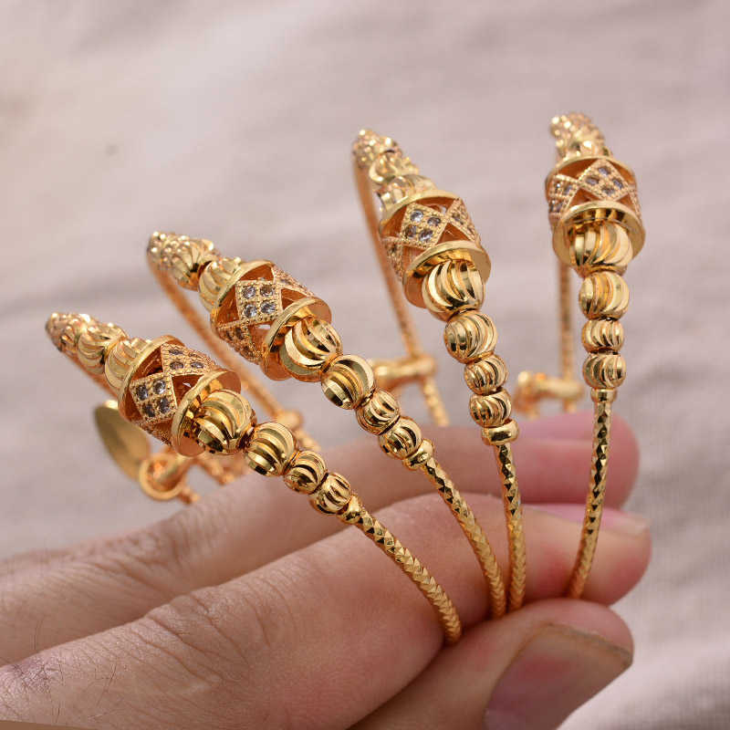 24k 4pcs Boys Girls Ethnic Gold Color Dubai Bangles Ethnic Lucky Bangles Bracelets Girl Bride Dubai Bangles Child Jewelry Gifts Q0720
24k 4pcs Boys Girls Ethnic Gold Color Dubai Bangles Ethnic Lucky Bangles Bracelets Girl Bride Dubai Bangles Child Jewelry Gifts Q0720