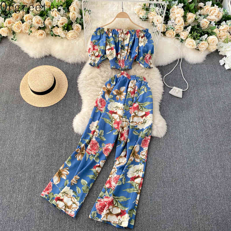 Summer Holiday Flower Printted 2 piece set Elastic Short Sleeve Slash Neck Collar Tops and High waist Wide leg pants Suits 210525
Summer Holiday Flower Printted 2 piece set Elastic Short Sleeve Slash Neck Collar Tops and High waist Wide leg pants Suits 210525