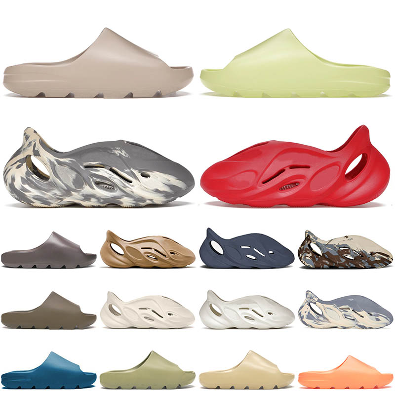 2022 Foam Runner Slipper Slide Mens Women Pure Glow Green Kid Moon Gray Enflame Orange Mineral Blue Bone Designer Luxurys Rubber Sandals Eur 32-47, B22 kids foam runner 32-35
2022 Foam Runner Slipper Slide Mens Women Pure Glow Green Kid Moon Gray Enflame Orange Mineral Blue Bone Designer Luxurys Rubber Sandals Eur 32-47, B22 kids foam runner 32-35