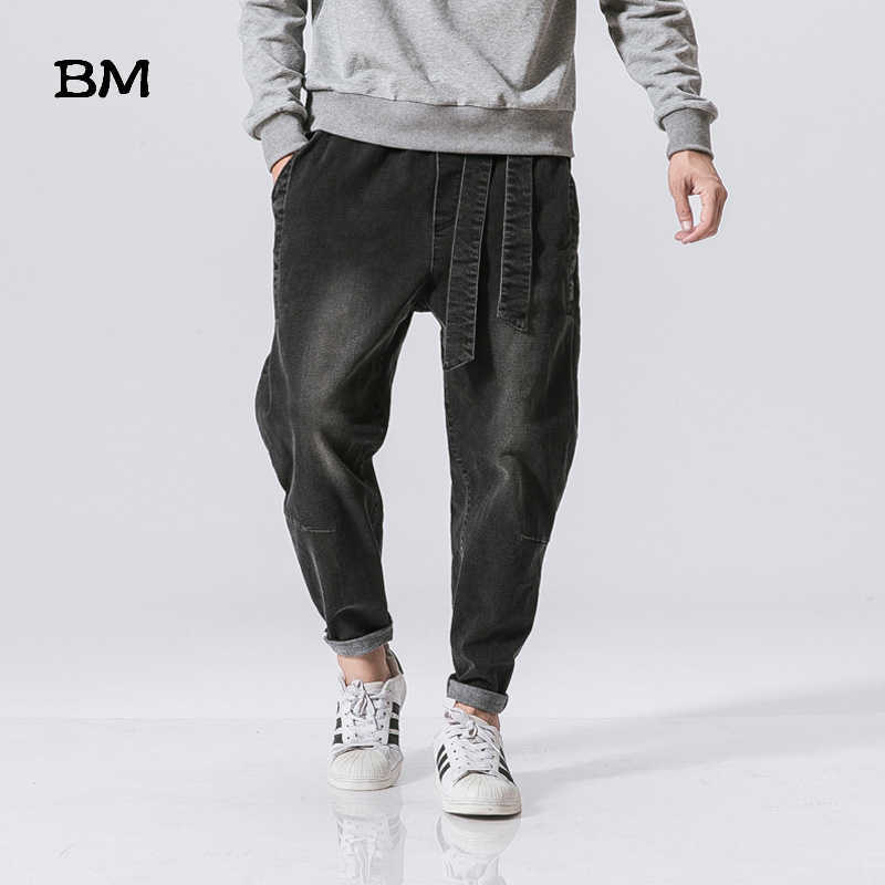 Streetwear High Quality Male Loose Feet Pants Chinese Retro Washed Loose Waist Jeans Harajkuku Baggy Harem Pants Men 5XL 211011