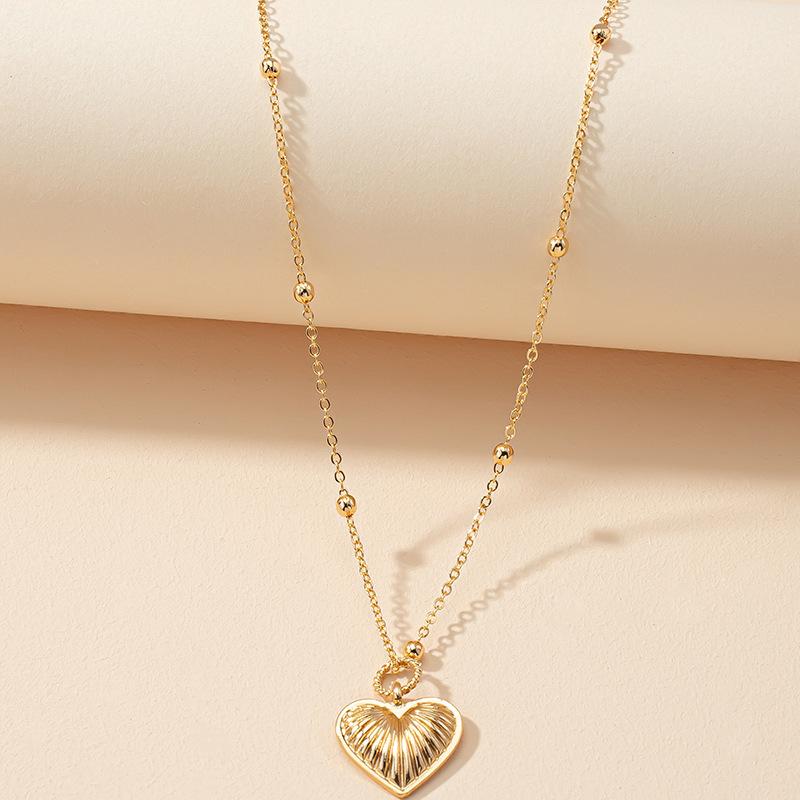 Pendant Necklaces Romantic Heart-shaped Texture Necklace Charming Gold Clavicle Chain Jewelry For Women Elegant Party Accessories
Pendant Necklaces Romantic Heart-shaped Texture Necklace Charming Gold Clavicle Chain Jewelry For Women Elegant Party Accessories
