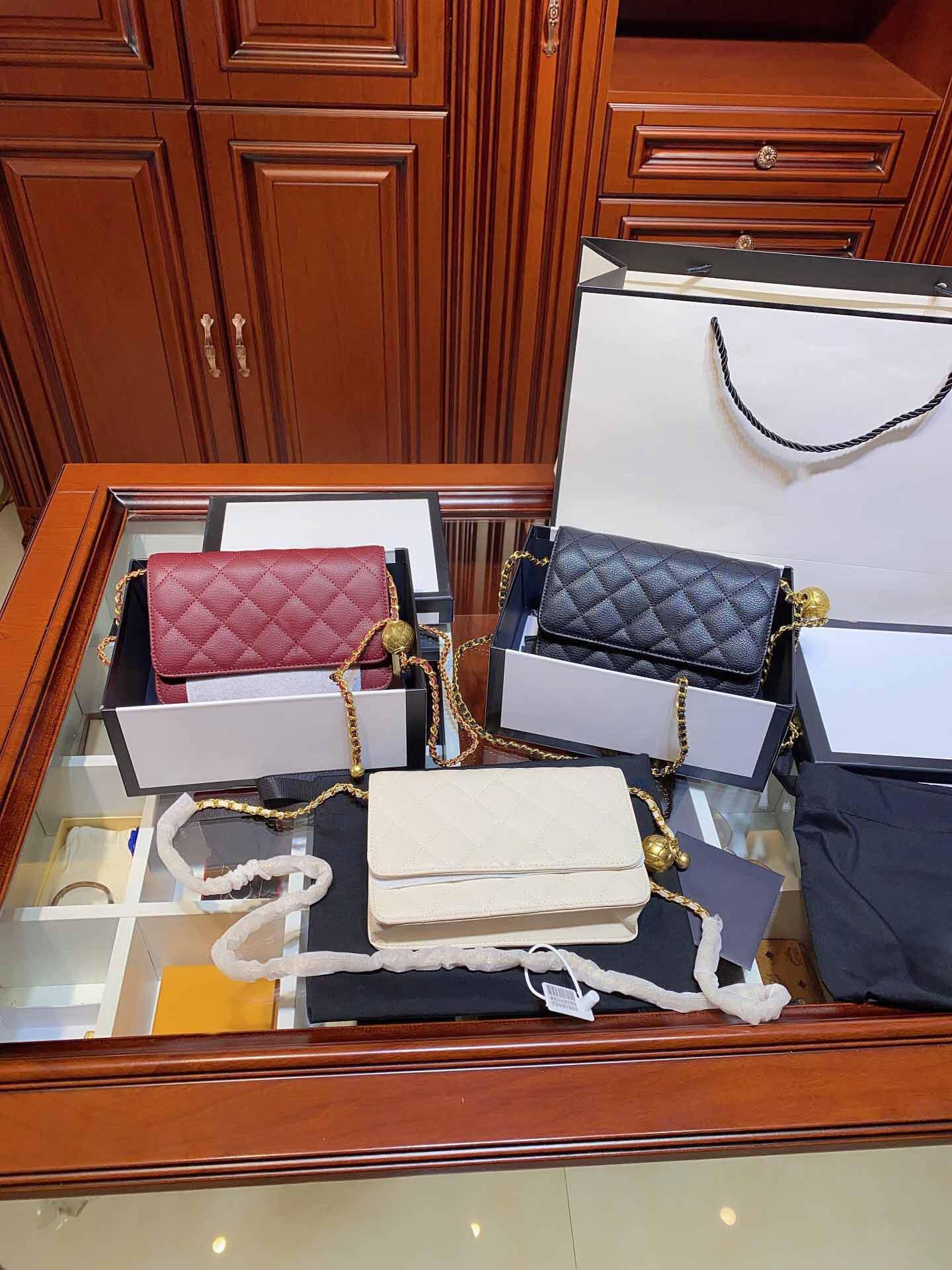 original box bag 2021 classic fashion golden ball chain buckle 8A + lambskin leather small all-match casual one-shoulder messenger bags woman wallet 
original box bag 2021 classic fashion golden ball chain buckle 8A + lambskin leather small all-match casual one-shoulder messenger bags woman wallet