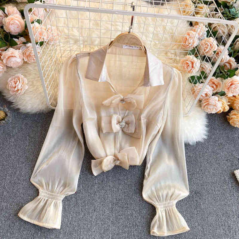 Spring Arrivals Solid Color Puff Sleeve Lapel Collar Bow Button Chiffon Mesh Top Shirt MZ380 210525, White
Spring Arrivals Solid Color Puff Sleeve Lapel Collar Bow Button Chiffon Mesh Top Shirt MZ380 210525, White
