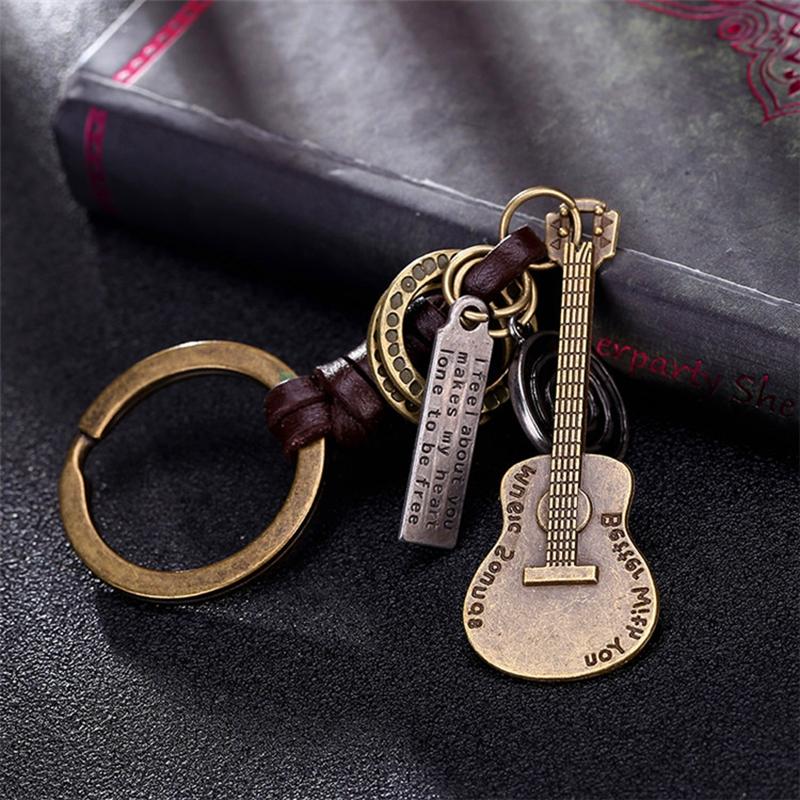 Keychains Alloy Vintage Guitar Key Rings Musical Instrument Braided Cowhide Keychain Pendant Gift For Friends 1PCS
Keychains Alloy Vintage Guitar Key Rings Musical Instrument Braided Cowhide Keychain Pendant Gift For Friends 1PCS