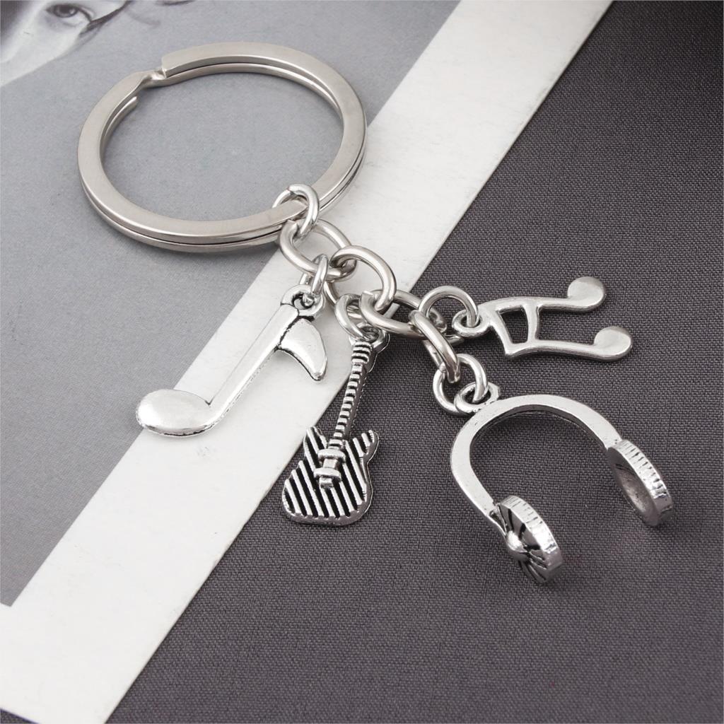 10pcMusic DJ Headset Keychain Guitar Musical Note Keyring Gifts for Men Women Gift Jewelry Diy Supplies E2581/E2773
10pcMusic DJ Headset Keychain Guitar Musical Note Keyring Gifts for Men Women Gift Jewelry Diy Supplies E2581/E2773