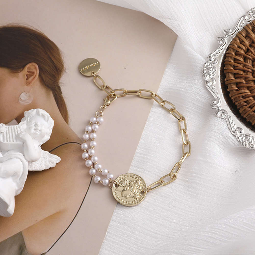 Hand catenary Simple niche design ins Style Bracelet creative asymmetry cool people head bracelet pearl jewelry E317, Golden;silver
Hand catenary Simple niche design ins Style Bracelet creative asymmetry cool people head bracelet pearl jewelry E317, Golden;silver