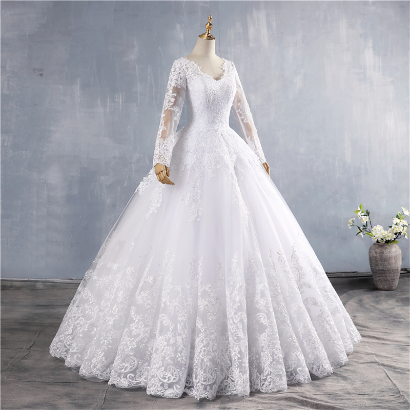 ZJ9160 2021 Dubai Elegant Long Sleeves Ball Gown Wedding Dresses Sheer Crew Neck Lace Appliques Beaded Vestios De Novia Bridal
