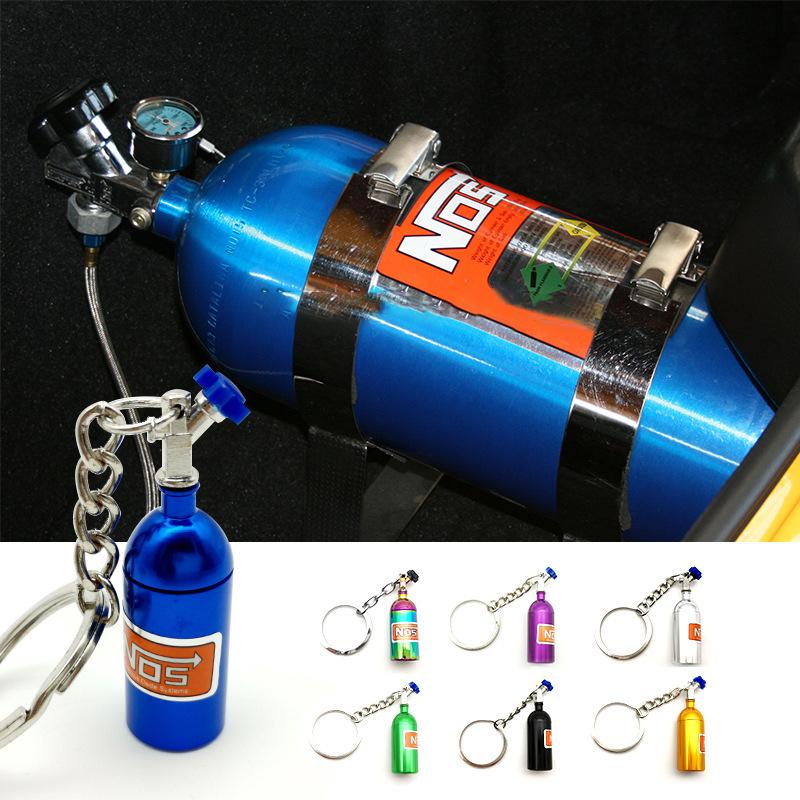 Keychains JDM Style Culture NOS Nitrogen Accelerator Bottle Shape Metal Keychain Pendant Car Modification Parts Removable Key Chain Ring