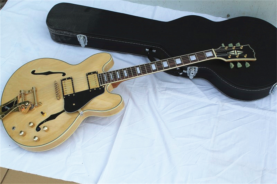 free delivery 35 electric guitar,burlywood guitar,semi hollow body,big bridge,4 switch,black pickups ,gold buttons,can add hardcase
free delivery 35 electric guitar,burlywood guitar,semi hollow body,big bridge,4 switch,black pickups ,gold buttons,can add hardcase