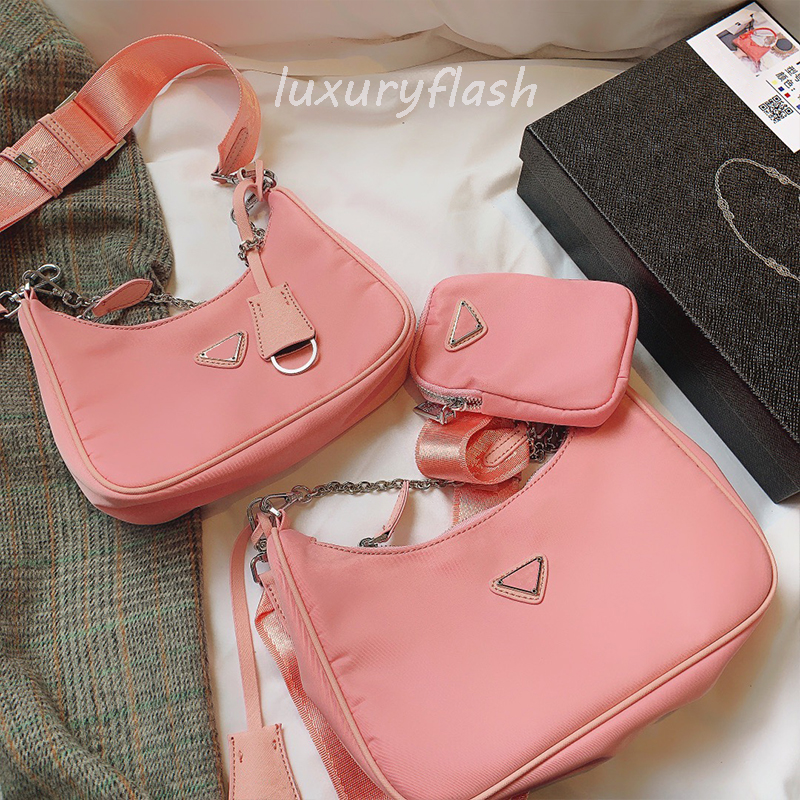 Designers Nylon Women Crossbody Bag Luxurys Pink Triangle Brand Wallet Fashion High Quality Purses Europe and America 2021 Trend Ladis Handbags, Box(not sold separately)
Designers Nylon Women Crossbody Bag Luxurys Pink Triangle Brand Wallet Fashion High Quality Purses Europe and America 2021 Trend Ladis Handbags, Box(not sold separately)