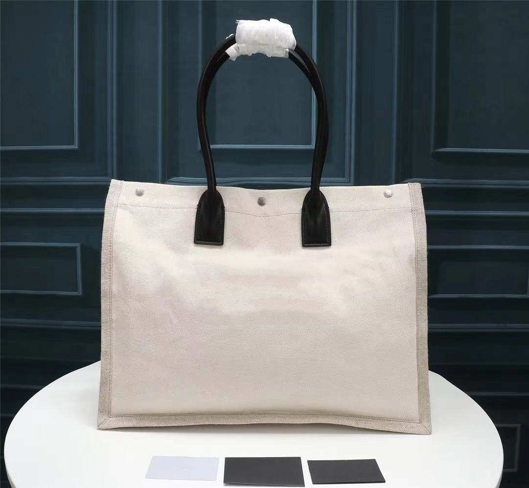 2021 Women handbags Rive Gauche Tote Bag shopping bag handbag high quality fashion linen Large Beach bags luxury designer travel bag 59929
2021 Women handbags Rive Gauche Tote Bag shopping bag handbag high quality fashion linen Large Beach bags luxury designer travel bag 59929