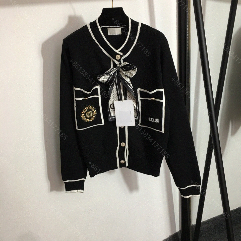 Fall cc designer women sweater jacket crochet mujer wool cardigan hoodie pearl badge logo 911 cch brand long sleeve coat sweaters casual fem, White;black
Fall cc designer women sweater jacket crochet mujer wool cardigan hoodie pearl badge logo 911 cch brand long sleeve coat sweaters casual fem, White;black