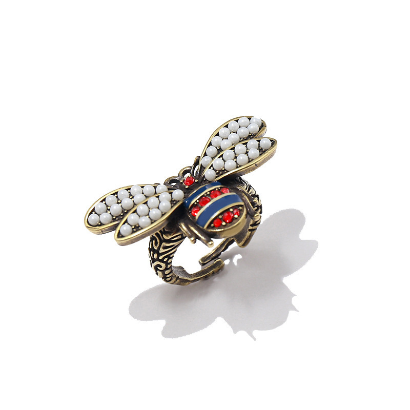 09 fashion accessories copper pearl double winged bee red and blue diamond ring, Silver
09 fashion accessories copper pearl double winged bee red and blue diamond ring, Silver