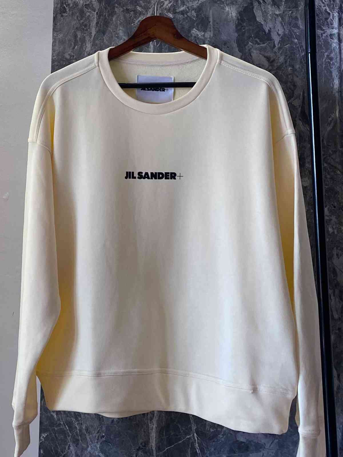 New Designer JIL SANDER Pullovers Men Women Minimalism Casual Harajuku Tops Streetwear Hoodies Oversize Sweatshirts H1009, Black
New Designer JIL SANDER Pullovers Men Women Minimalism Casual Harajuku Tops Streetwear Hoodies Oversize Sweatshirts H1009, Black