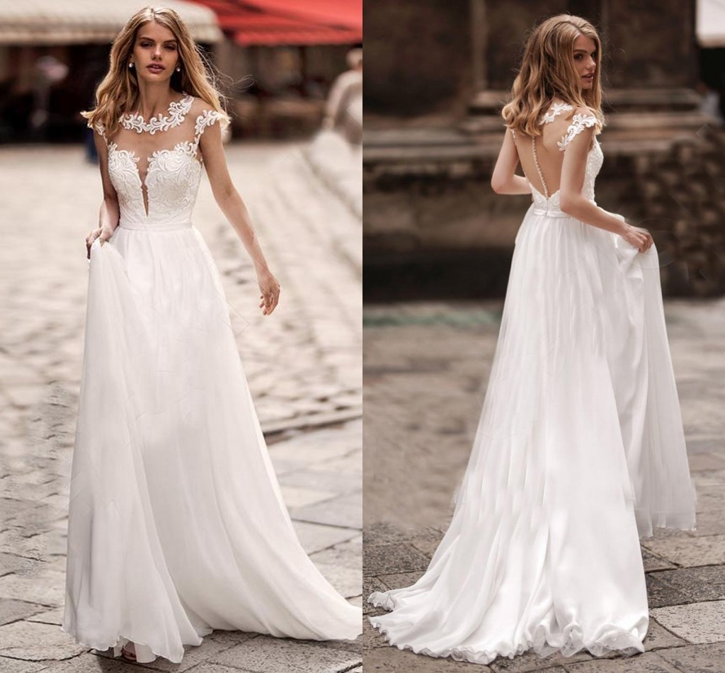 2021 Boho Lace Wedding Dresses A Line Cap Sleeves Sheer O Neck Bridal Gown Sweep Train Appliqued Country Beach Vestidos De Noiva, White
2021 Boho Lace Wedding Dresses A Line Cap Sleeves Sheer O Neck Bridal Gown Sweep Train Appliqued Country Beach Vestidos De Noiva, White