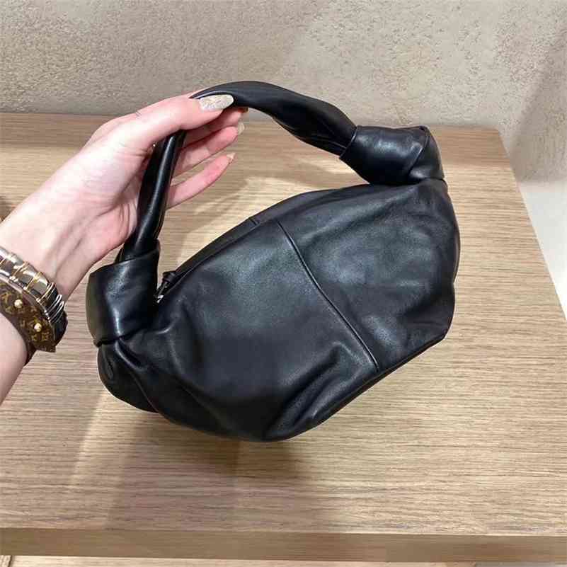 Wholesale venetas bottega leisure fashion female woven coachs armpit evening knotting cloud bag co wan NED9
Wholesale venetas bottega leisure fashion female woven coachs armpit evening knotting cloud bag co wan NED9