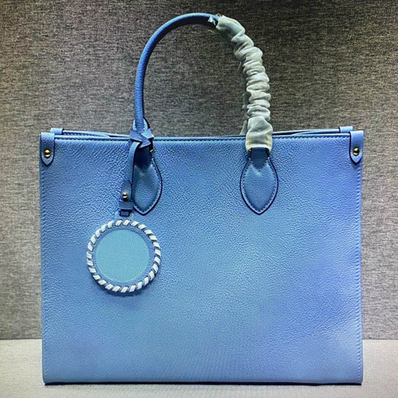 M45718 ONTHEGO tote bag woman casual luxurys designers leather fashion shoulder female purse large capacity shopping handbags M45717
M45718 ONTHEGO tote bag woman casual luxurys designers leather fashion shoulder female purse large capacity shopping handbags M45717