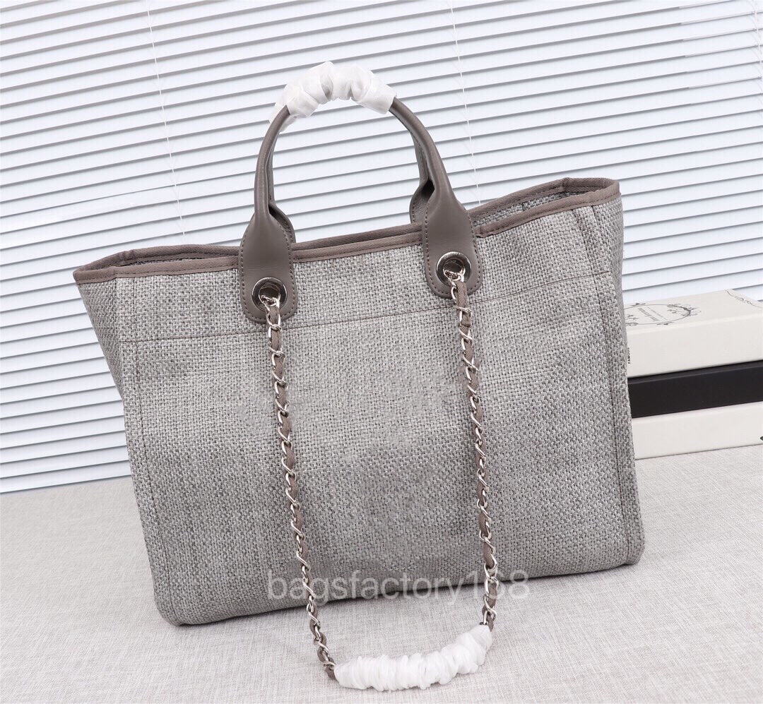 Top Design Luxury Brand Bag Linen Canvas Beach Bags Braided Chain Single Shoulder Handbag Large Capacity Leather Handle Splice Shopping Tote
Top Design Luxury Brand Bag Linen Canvas Beach Bags Braided Chain Single Shoulder Handbag Large Capacity Leather Handle Splice Shopping Tote