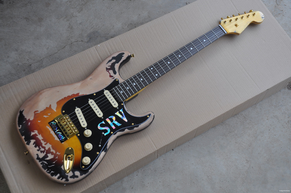 Vintage Electric Guitar with SRV Pickguard,SSS Pickups,Rosewood Fretboard,Gold hardware
Vintage Electric Guitar with SRV Pickguard,SSS Pickups,Rosewood Fretboard,Gold hardware