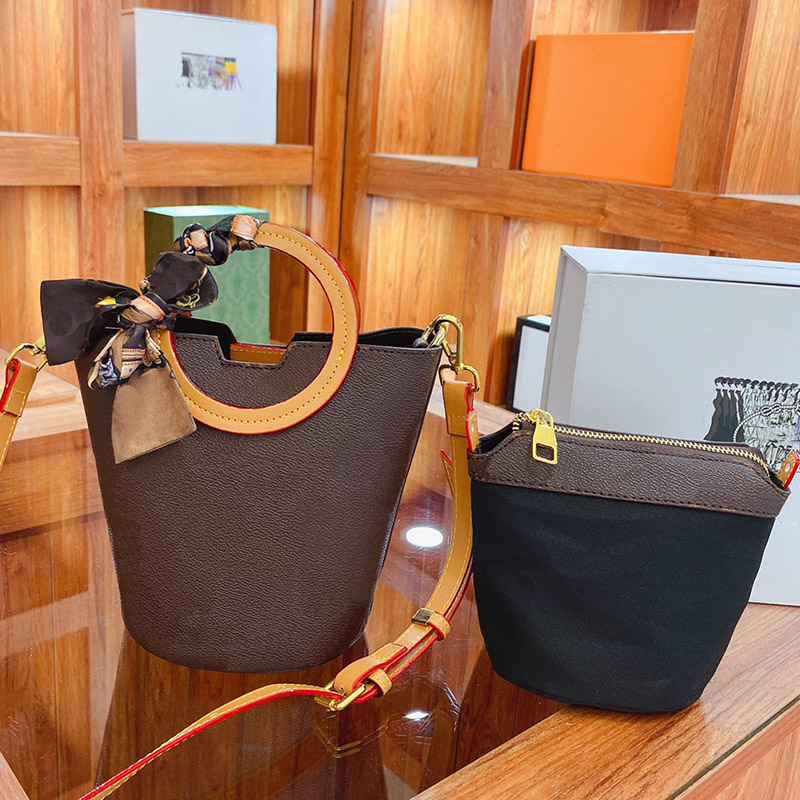 2 pieces Set High Quality Bucket Bags Luxurys Designers Drawstring Fashion Womens CrossBody Handbag Shoulder Bag Purse Mini Cross Body, Increase freight
2 pieces Set High Quality Bucket Bags Luxurys Designers Drawstring Fashion Womens CrossBody Handbag Shoulder Bag Purse Mini Cross Body, Increase freight