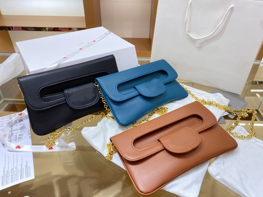 2021 luxury designer ladies fashion chain shoulder bag black blue letter hand clip saddle girl lady messenger 
2021 luxury designer ladies fashion chain shoulder bag black blue letter hand clip saddle girl lady messenger