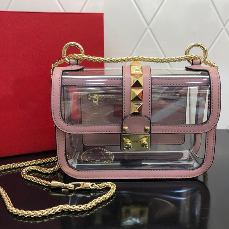 pvc transparent shoulder bag chain crossbody bags women clear jelly handbag wallets rivet decor hardware fashion letter handbags summer styl
pvc transparent shoulder bag chain crossbody bags women clear jelly handbag wallets rivet decor hardware fashion letter handbags summer styl