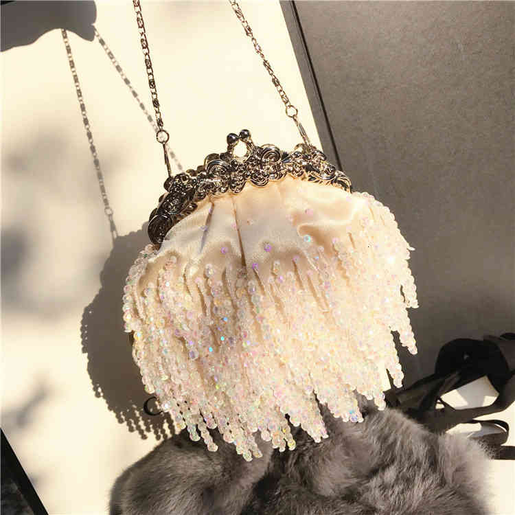 Evening Bags Mini versatile ladies fashion silk tassel hand pearl cheongsam, 1# shoe box
Evening Bags Mini versatile ladies fashion silk tassel hand pearl cheongsam, 1# shoe box