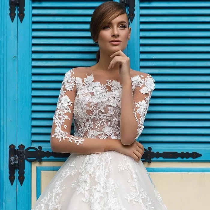Ball Gown Wedding Dresses long Sleeves Lace Appliqued Illusion Back Boho Bridal Gowns Long Train Bride Dresses