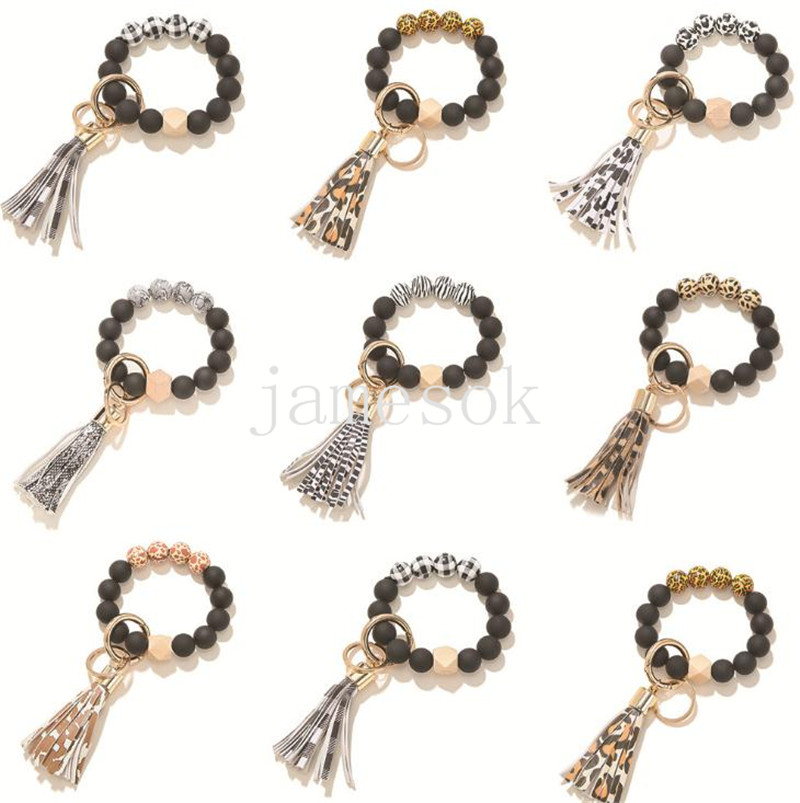 Black Frosted Wooden Bead Bracelet Keychain Fashion Pattern Tassel Pendant Bracelets Women Girl Key ring Wrist Strap 7 Colors DD255
Black Frosted Wooden Bead Bracelet Keychain Fashion Pattern Tassel Pendant Bracelets Women Girl Key ring Wrist Strap 7 Colors DD255