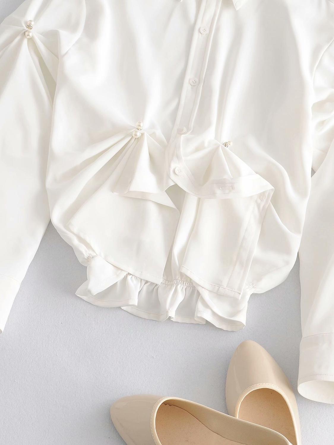 French Lapel Pleated Ruched Button Pearl White Shirt Short Women Blouse Hem Irregular Long Puff Sleeve Tops 210429