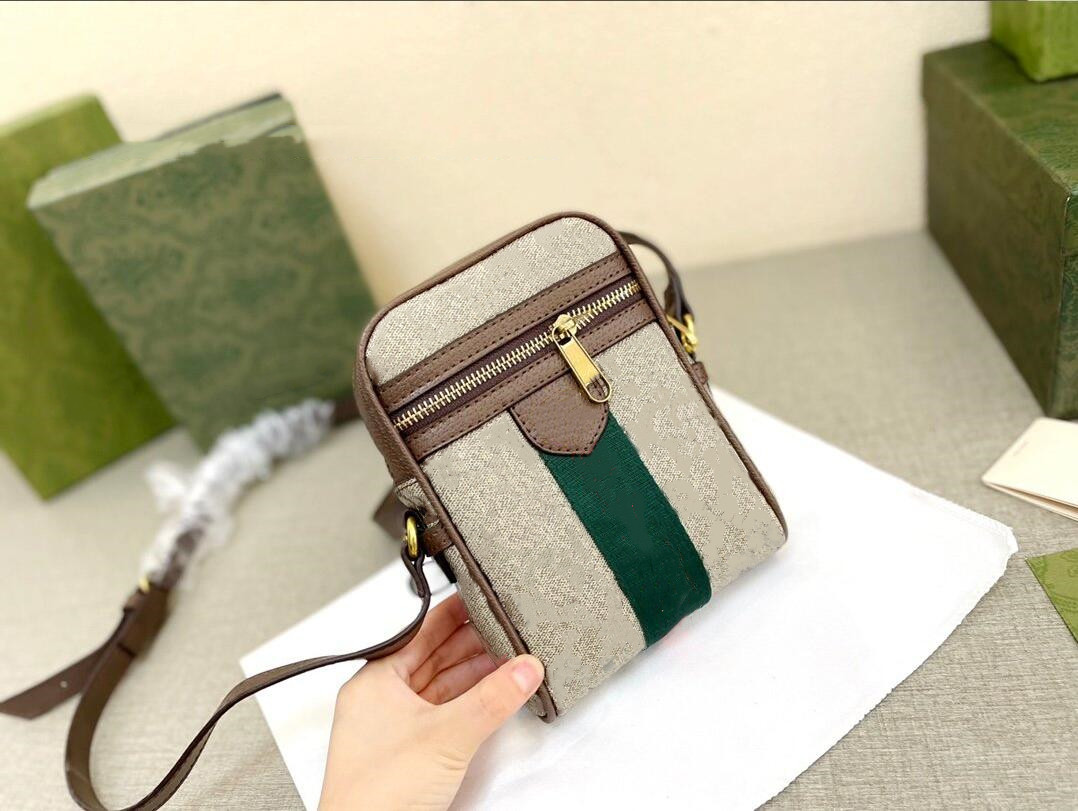 2021 New Luxury bags Designer bag Mini Cross-body Men's and women's same purse tote 598127, Brown
2021 New Luxury bags Designer bag Mini Cross-body Men's and women's same purse tote 598127, Brown
