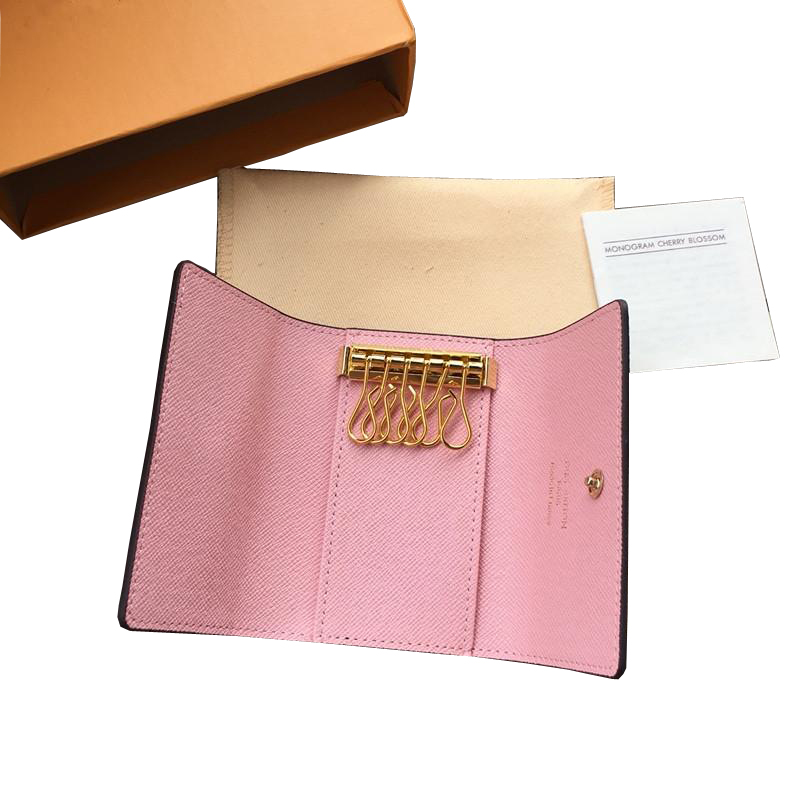 Luxurys designers wallets 2021 High quality women classic 6 key holder cover keychain men with box.dust wallet card ring 7 colors b27, Red;black
Luxurys designers wallets 2021 High quality women classic 6 key holder cover keychain men with box.dust wallet card ring 7 colors b27, Red;black