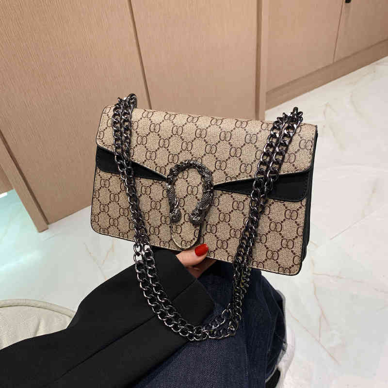 2022 designer s Contrast Mermaid snake head small square new simple letter single shoulder women's tide chain messenger bag, Green
2022 designer s Contrast Mermaid snake head small square new simple letter single shoulder women's tide chain messenger bag, Green