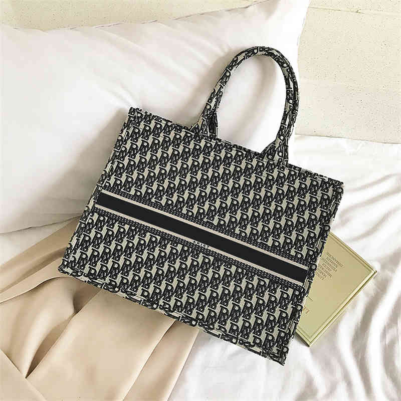 Wholesale Top Quality Luxurys Designers Bag Fashion Book Tote Woman Canvas Embroidery Luxury Designer Handbags Oblique old flower Shoulder, Blue letter
Wholesale Top Quality Luxurys Designers Bag Fashion Book Tote Woman Canvas Embroidery Luxury Designer Handbags Oblique old flower Shoulder, Blue letter