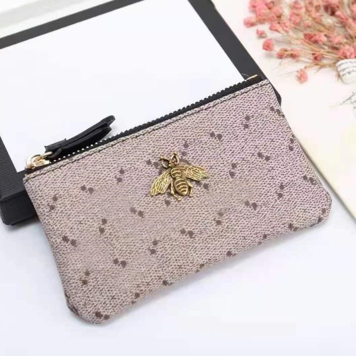 KEY POUCH M62650 POCHETTE CLES Designer Purse Fashion Womens Mens Credit Card Holder Coin Bag Luxury Mini Wallet Bags Charm Brown Canvas, Red;black
KEY POUCH M62650 POCHETTE CLES Designer Purse Fashion Womens Mens Credit Card Holder Coin Bag Luxury Mini Wallet Bags Charm Brown Canvas, Red;black