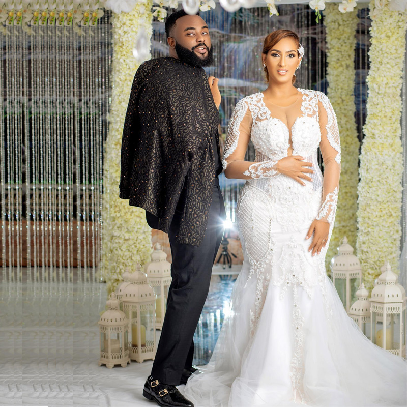 Modern Pearls Beaded Mermaid Wedding Dresses With Long Sleeve Lace Appliqued Sweep Train Trumpet Bridal Gowns Sheer Jewel Neck Illusion Plus Size Brid