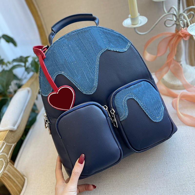 Luxury Backpack Letter embroidery Monogra multipockets Denim Cloth Leather Contrasting backpack style with heart pendant large satchel bags