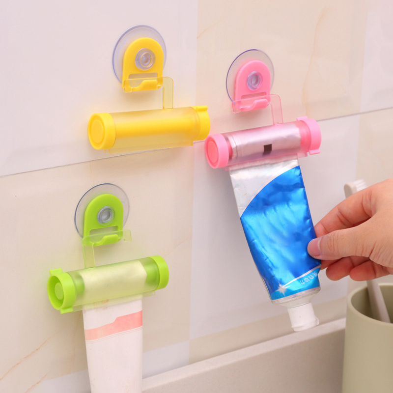 1Pcs With Sucker Hook Portable Multi Purpose Plastic Reuse Rolling Squeezer Toothpaste Dispenser Manual Bathroom Accessories