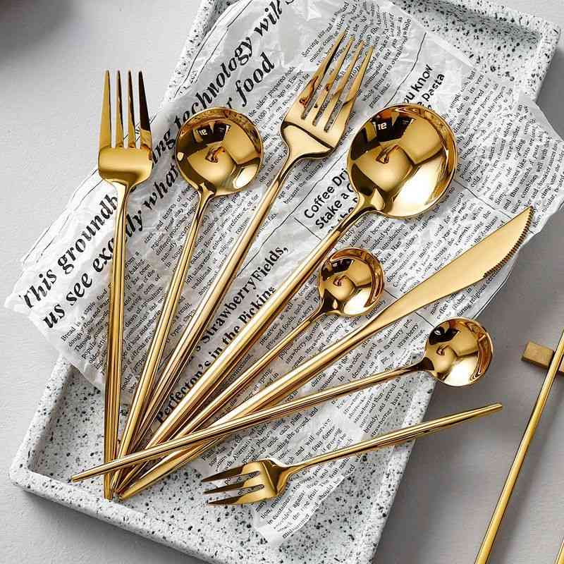 European 304 stainless steel golden Portuguese mirror Western food knife, fork, spoon, chopsticks four piece steak tableware set
European 304 stainless steel golden Portuguese mirror Western food knife, fork, spoon, chopsticks four piece steak tableware set