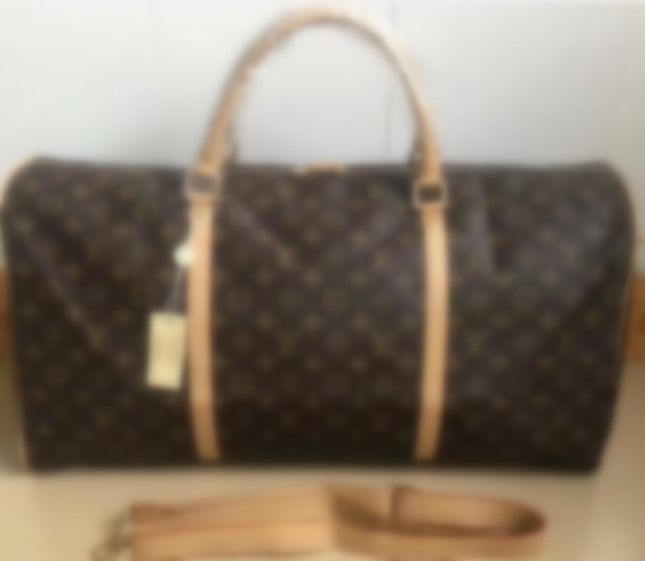 High quality Duffel bag men women travel bags hand luggage luxury designer travel bag pu leather handbags large cross body totes 55cm 005
High quality Duffel bag men women travel bags hand luggage luxury designer travel bag pu leather handbags large cross body totes 55cm 005