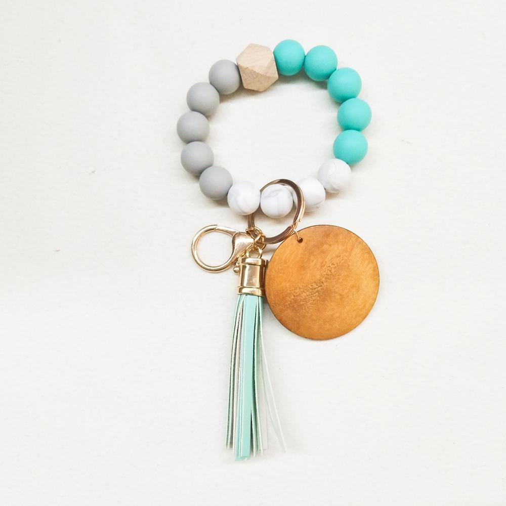 Foreign trade food grade silicone beads wrist keychain PU leather tassel key ring female multi-color optional