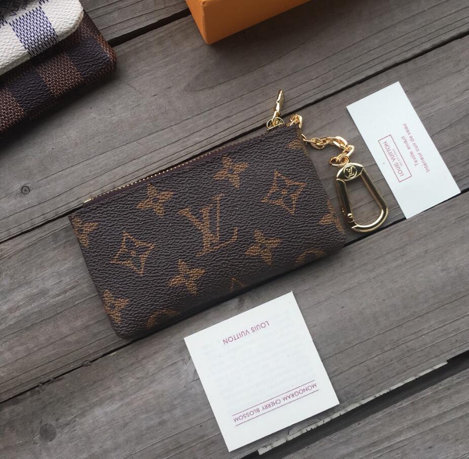 M62650 POCHETTE CLES Designer Coin Purse Key Pouch chains ring Credit Card Holder Luxury Mini Wallet shoulder Bag Charm Handbags LVLOUISVITTON VUTTON, Brown flowers
M62650 POCHETTE CLES Designer Coin Purse Key Pouch chains ring Credit Card Holder Luxury Mini Wallet shoulder Bag Charm Handbags LVLOUISVITTON VUTTON, Brown flowers