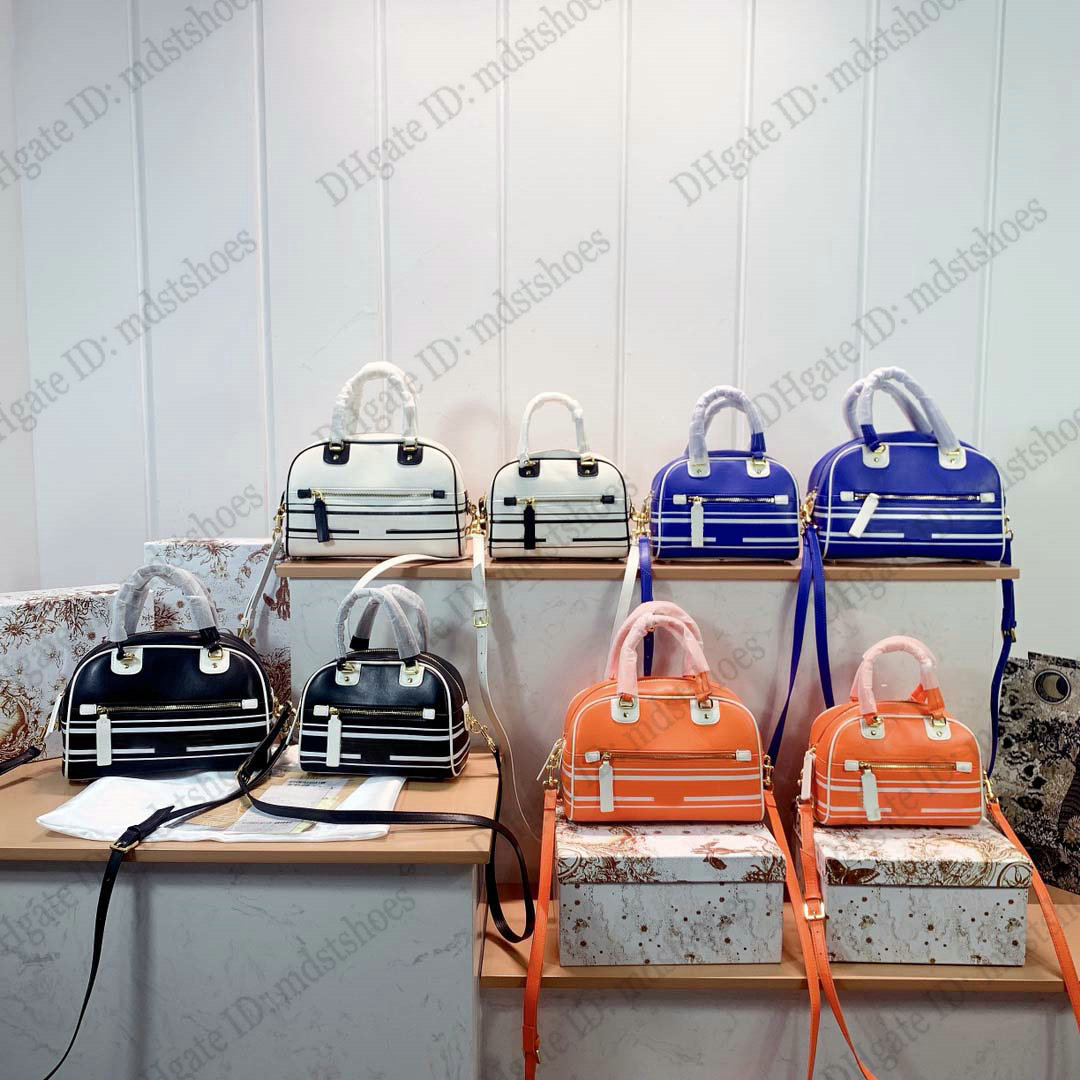PARIS VIBE Zip Bowling Bag Bicourlor Smooth Calfskin Front Logo Zipped Pocket With Leather Shoulder Strap Luxurys Sports Handbag Size 20 25
PARIS VIBE Zip Bowling Bag Bicourlor Smooth Calfskin Front Logo Zipped Pocket With Leather Shoulder Strap Luxurys Sports Handbag Size 20 25