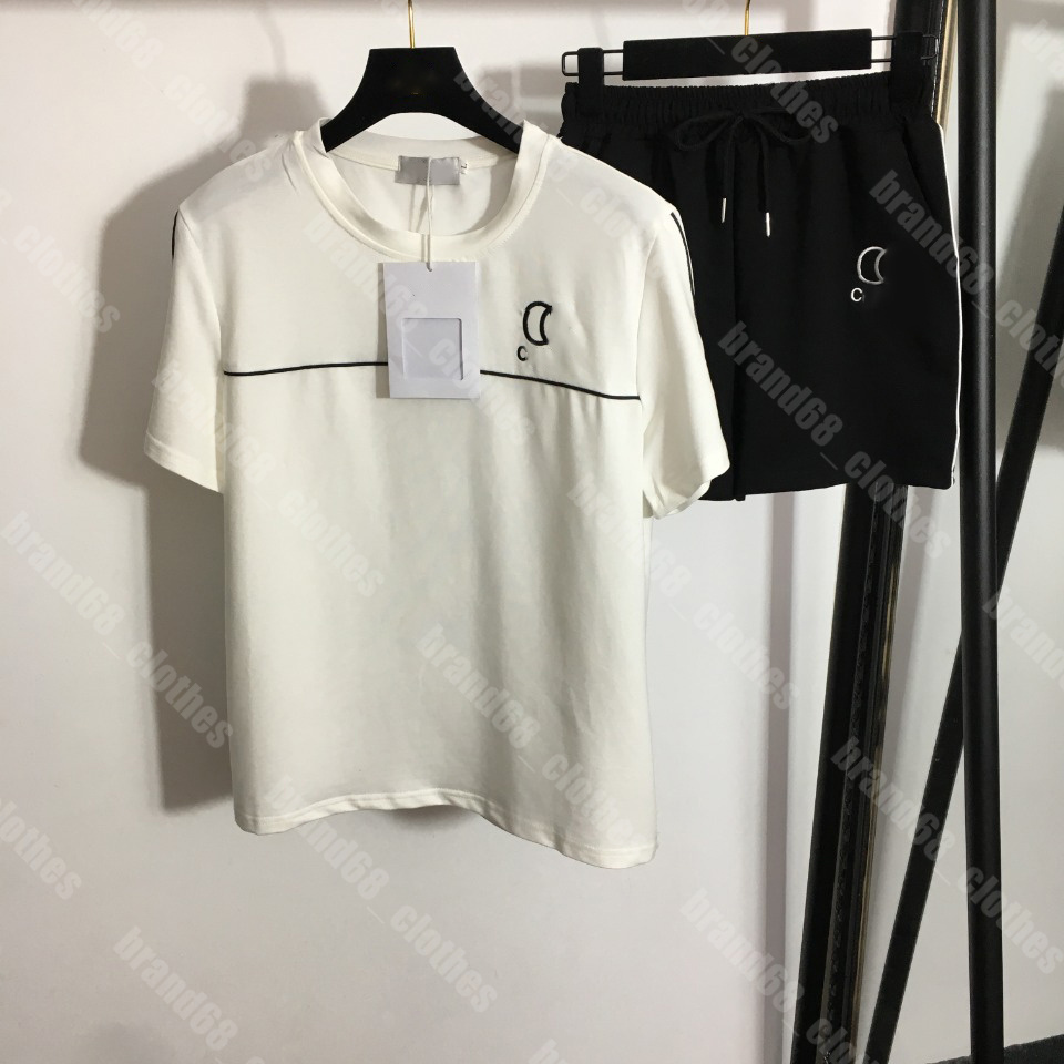 Summer Women Two Piece Pants Sets simple cotton tee shorts set white crew neck pullover Breathable Sports running Tracksuit luxury ch..el designer female Apparel, 11 
Summer Women Two Piece Pants Sets simple cotton tee shorts set white crew neck pullover Breathable Sports running Tracksuit luxury ch..el designer female Apparel, 11