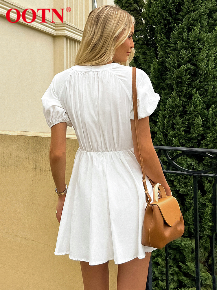 OOTN Sexy Cotton Hollow Out White Dresses Summer Elegant Bow Puff Sleeve Mini Dress Deep V-Neck Pleated Women Dress Casual 220511
