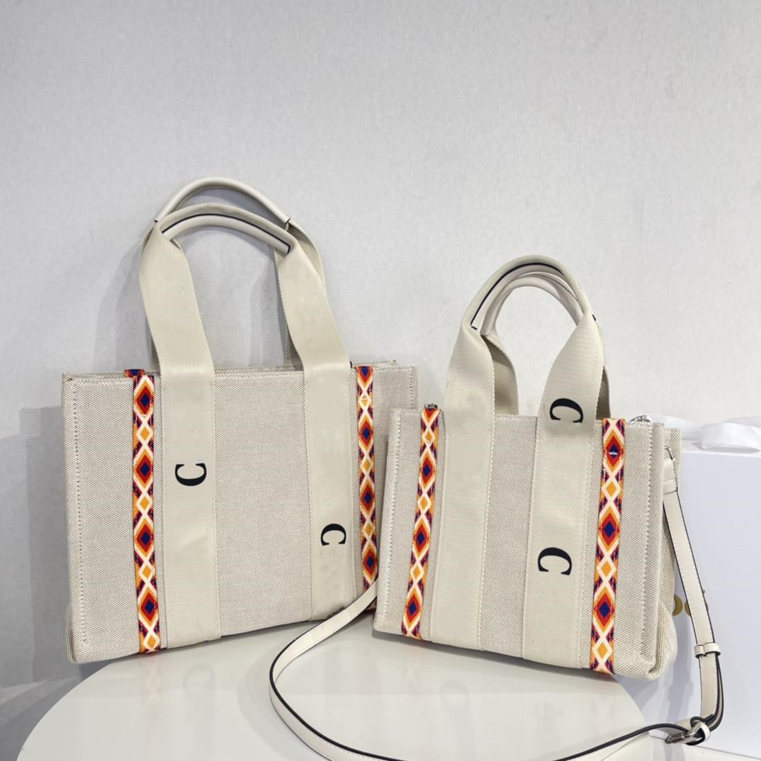 Top Quality Canvas Shopping Bags Large Capacity Package Travelling Bag Fashion High Quality Letter Adjustable Shoulder Strap Black White Brown Open
Top Quality Canvas Shopping Bags Large Capacity Package Travelling Bag Fashion High Quality Letter Adjustable Shoulder Strap Black White Brown Open